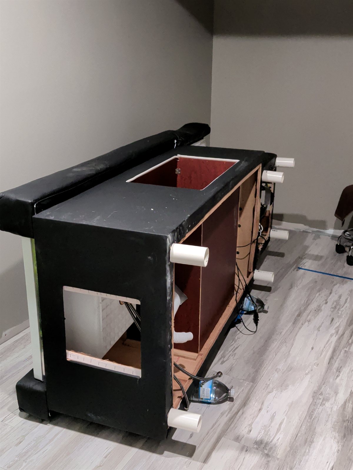 The specialist head spa bed being prepared and connected.